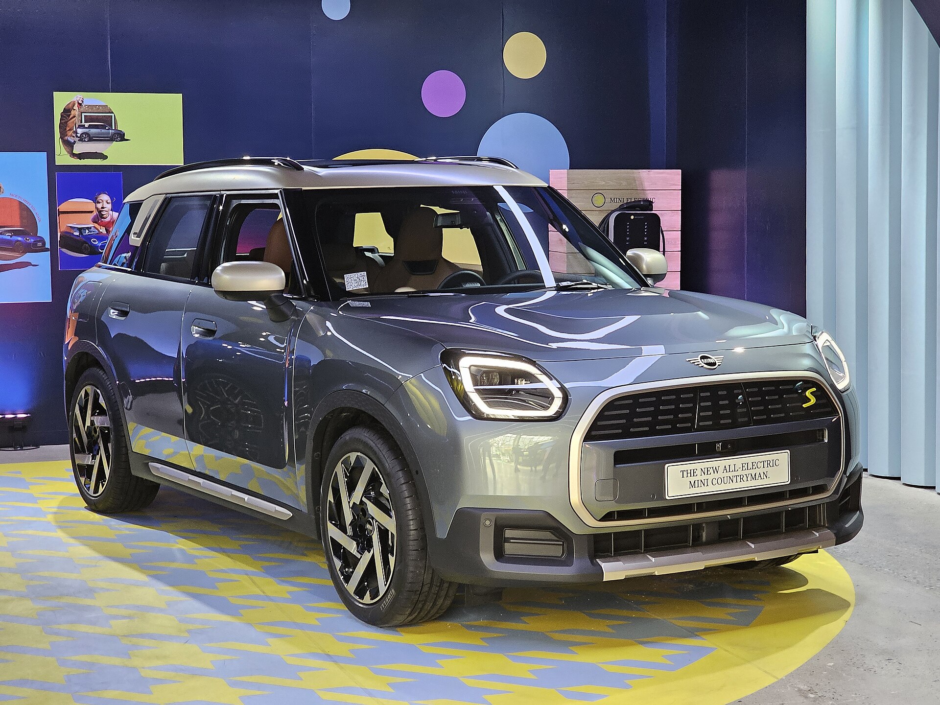 Smokey Green MINI U25E Countryman SE ALL4 Favoured Electric SUV at MINI Heritage &amp; Beyond.
