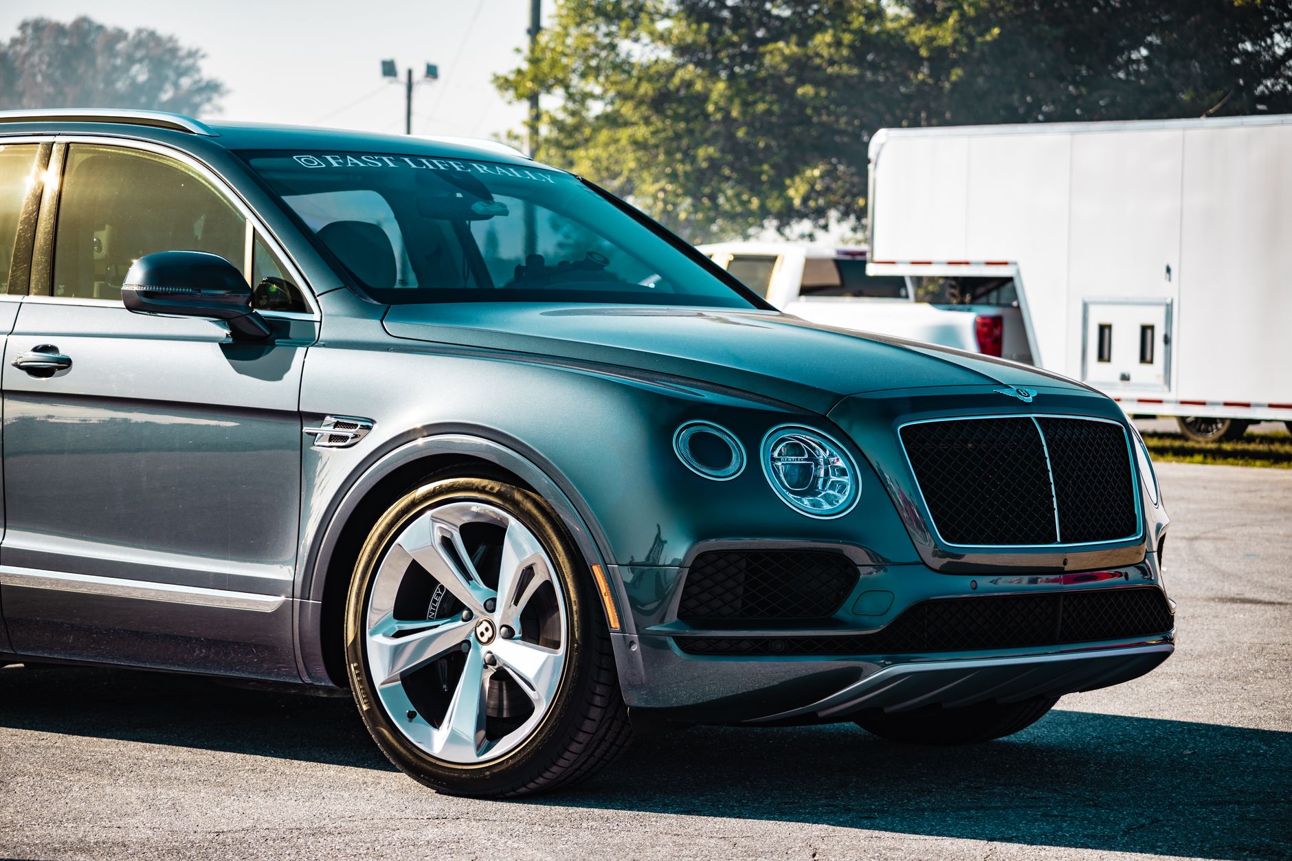 A stylish Bentley SUV parked in West Palm Beach, showcasing elegance and automotive design.