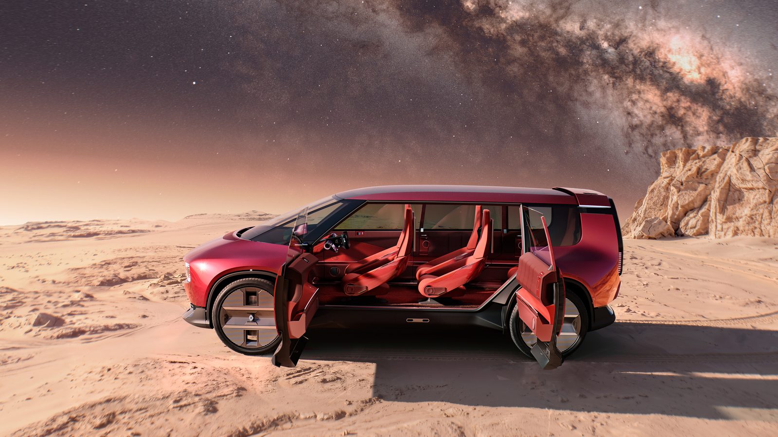 A modern minivan moving swiftly on a scenic highway surrounded by lush greenery.