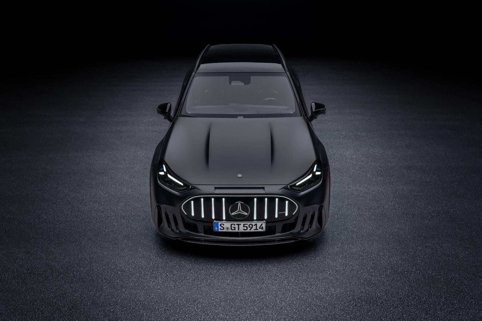 Close-up shot of a sleek white Mercedes EQC, showcasing luxurious design in an urban environment.